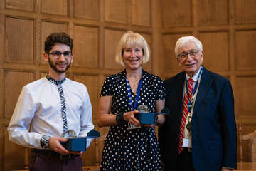 elleke luan being presented with their award